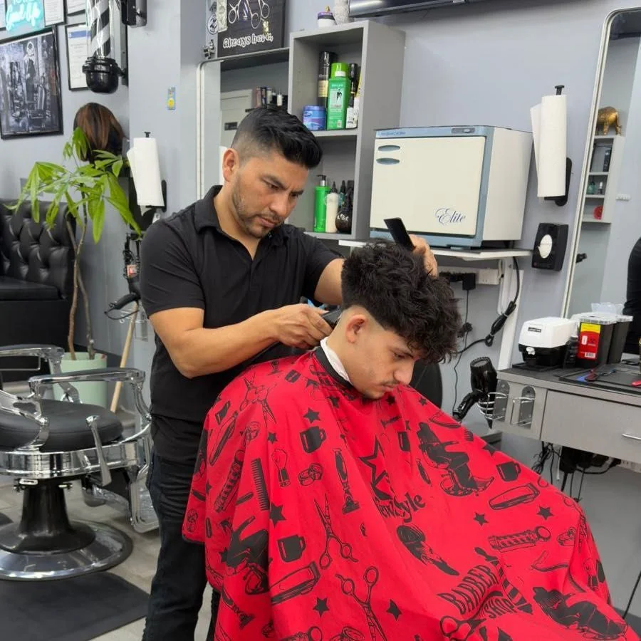 Cristian, barber at New Style